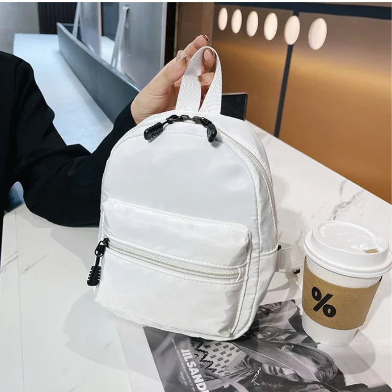 Fashion Solid Color Backpack Women Nylon Knapsack Preppy Style Mini Rucksacks bag for women Fatu Pondo Foundation