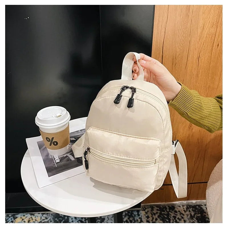 Fashion Solid Color Backpack Women Nylon Knapsack Preppy Style Mini Rucksacks bag for women Fatu Pondo Foundation