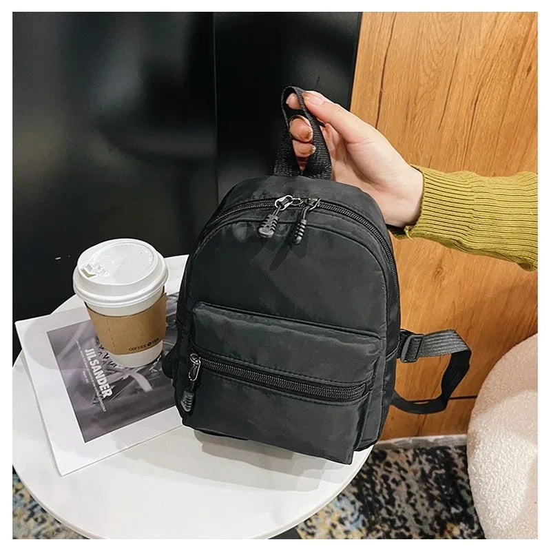 Fashion Solid Color Backpack Women Nylon Knapsack Preppy Style Mini Rucksacks bag for women Fatu Pondo Foundation