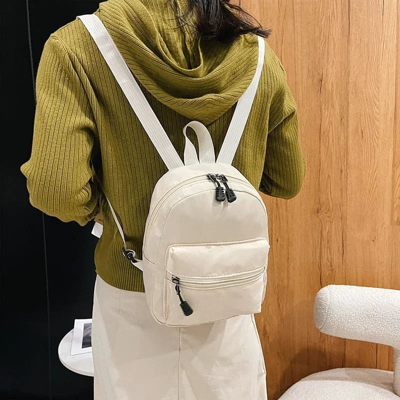 Fashion Solid Color Backpack Women Nylon Knapsack Preppy Style Mini Rucksacks bag for women Fatu Pondo Foundation