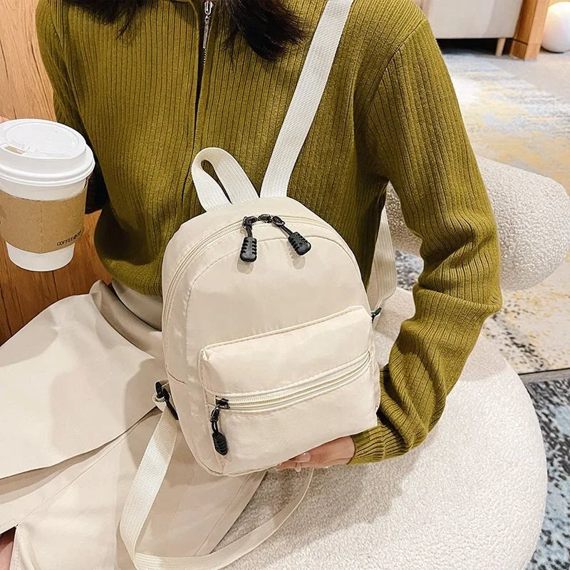 Fashion Solid Color Backpack Women Nylon Knapsack Preppy Style Mini Rucksacks bag for women Fatu Pondo Foundation